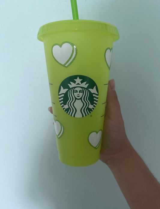 Green Starbucks cup with hearts